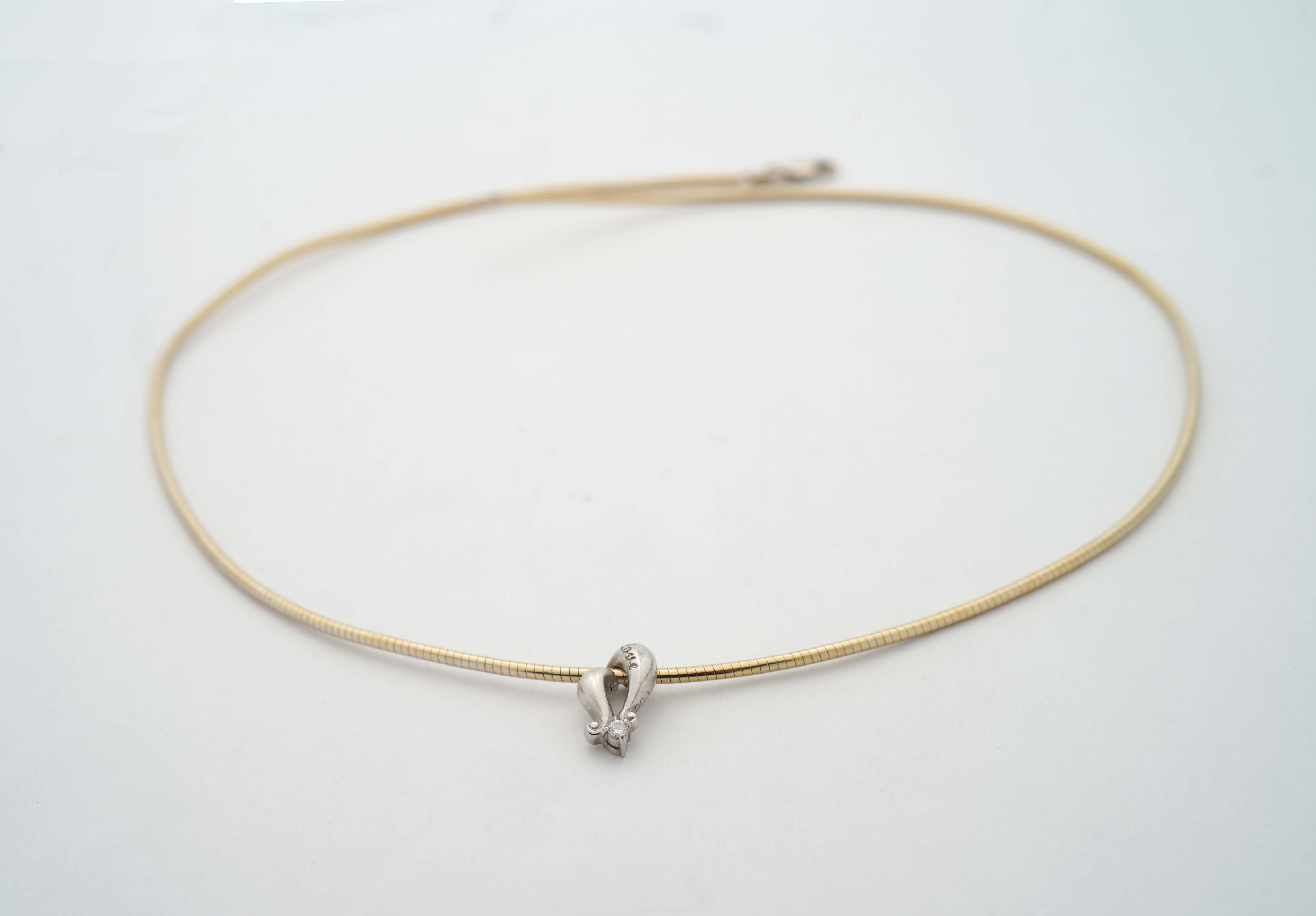 K18ホワイトゴールド製オメガネックレスの再メッキ加工